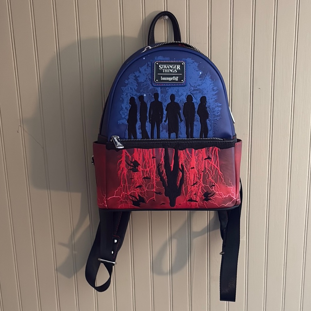 Loungefly Blue and Red Backpack with Artistic Design